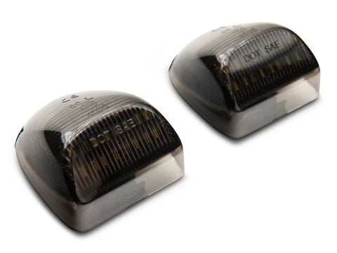 Raxiom 01-13 Chevrolet Silverado/GMC Sierra 1500 Axial Series LED License Plate Lamps- Smoked - S122507
