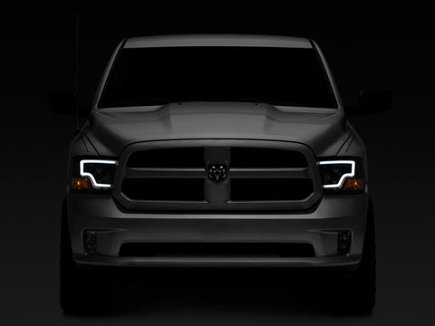 Raxiom 09-18 Dodge RAM 1500 LED Bar Headlights- Black Housing (Clear Lens) - R117803