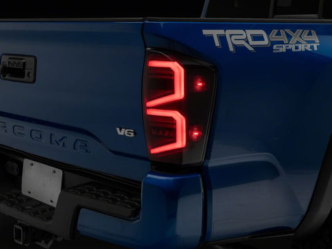 Raxiom 16-23 Toyota Tacoma ST LED Tail Lights- Black Housing- Smoked Lens - TT42787