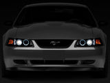Raxiom 99-04 Ford Mustang Dual LED Halo Projector Headlights- Black Housing (Smoked Lens) - 49113