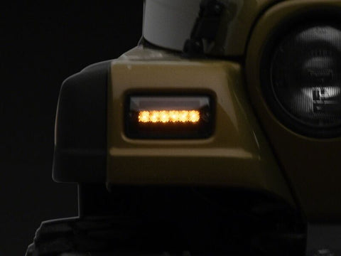 Raxiom 97-06 Jeep Wrangler TJ Axial Series LED Sequential Cornering Lights- Smoked - J211784