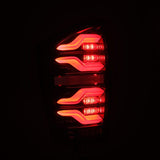 AlphaRex 16-21 Toyota Tacoma LUXX LED Taillights Alpha Blk w/Activ Light/Seq Signal - 680080