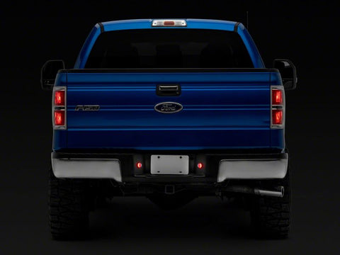 Raxiom 10-14 Ford F-150 Axial Series LED License Plate Lamps- Red and White - T557361
