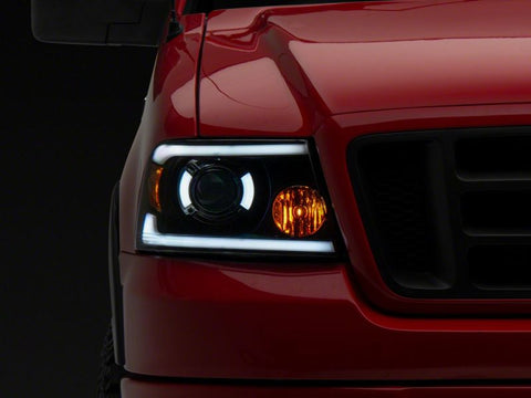 Raxiom 04-08 Ford F-150 Axial Series Projector Headlights w/ SEQL LED Bar- Blk Housing (Clear Lens) - T566364