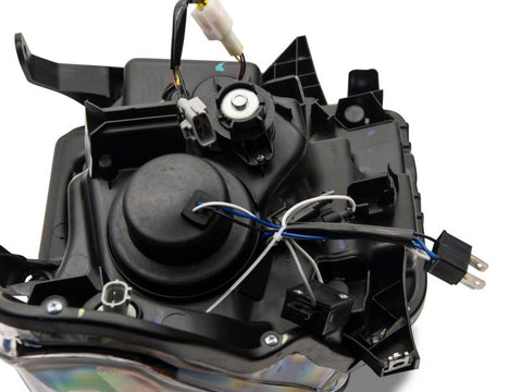 Raxiom 14-21 Toyota Tundra Axial Projector Headlights w/ SEQL LED Bar- Blk Housing (Clear Lens) - TU16011