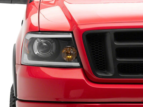 Raxiom 04-08 Ford F-150 Axial Series Projector Headlights with LED Bar- Black Housing- Clear Lens - T566363