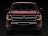 Raxiom 07-13 Chevrolet Silverado 1500 Axial Headlights w/ SEQL LED Bar- Blk Housing (Clear Lens) - S138004