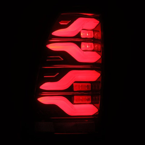 AlphaRex 05-15 Toyota Tacoma LUXX LED Taillights Blk/Red w/Activ Light/Seq Signal - 680070