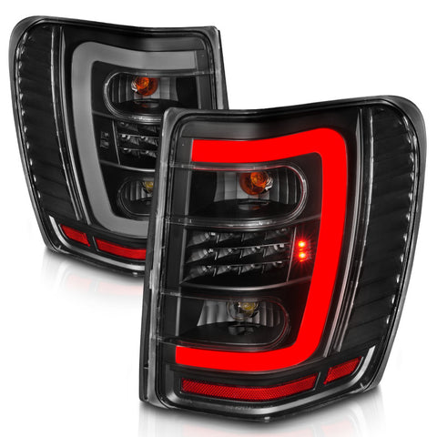 ANZO 1999-2004 Jeep Grand Cherokee LED Tail Lights w/ Light Bar Black Housing Clear Lens - 311394