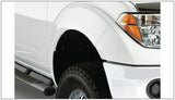 Bushwacker 06-14 Nissan Frontier Styleside Boss Pocket Style Flares 4pc 73.3in Bed - Black - 71907-02