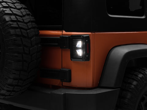 Raxiom 07-18 Jeep Wrangler JK Axial Series Vision LED Tail Lights- Black Housing (Smoked Lens) - J130808