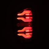 AlphaRex 16-21 Toyota Tacoma LUXX LED Taillights Alpha Blk w/Activ Light/Seq Signal - 680080