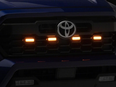Raxiom 24-26 Toyota Tacoma Pre Runner/TRD Off-Road/TRD Sport Amber LED Grille Light- Smoked Lens - TT65015