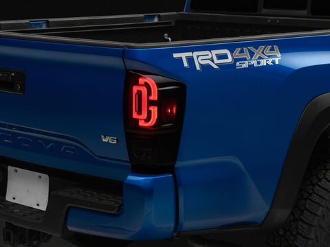 Raxiom 16-23 Toyota Tacoma XW Series Sequential LED Tail Lights- Black Housing/ Smoked Lens - TT30330