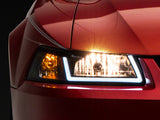 Raxiom 99-04 Ford Mustang Axial Series Headlights w/ LED Bar- Blk Housing (Clear Lens) - 422712