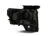 Raxiom 09-14 Ford F-150 Super White LED Halo Projector Headlights- Blk Housing (Clear Lens) - T542825