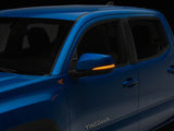 Raxiom 16-23 Toyota Tacoma Axial Series Amber LED Mirror Lights- Clear - TT31364