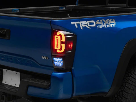 Raxiom 16-23 Toyota Tacoma XW Series Sequential LED Tail Lights- Black Housing/ Smoked Lens - TT30330