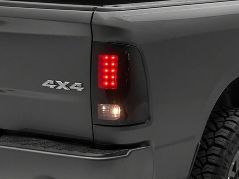 Raxiom 09-18 Dodge RAM 1500/2500/3500 Axial Series LED Tail Lights- BlkHousing- SmokedLens - R131283
