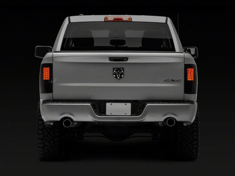 Raxiom 09-18 Dodge RAM 1500/2500/3500 Axial Series LED Tail Lights- BlkHousing- SmokedLens - R131283