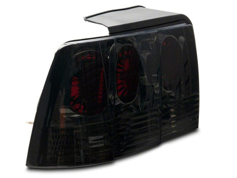 Raxiom 99-04 Ford Mustang Axial Series Altezza Style Tail Lights- Blk Housing (Smoked Lens) - 413422