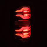 AlphaRex 14-21 Toyota Tundra LUXX LED Taillights Blk w/Activ Light/Seq Signal - 672040