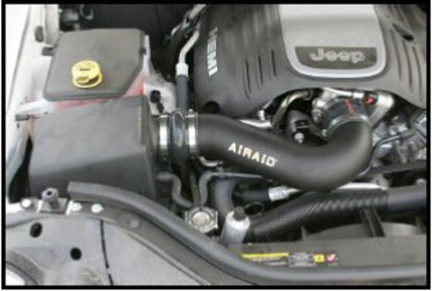 Airaid 05-10 Jeep Grand Cherokee 5.7L Hemi Airaid Jr Intake Kit - Dry / Red Media - 311-770