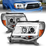 ANZO 2005-2011 Toyota Tacoma Projector Headlights w/ Light Bar Chrome Housing - 111518
