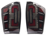 Raxiom 16-23 Toyota Tacoma LED Tail Lights- Blk Housing (Smoked Lens) - TT32385