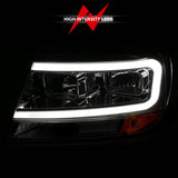 ANZO 1999-2004 Jeep Grand Cherokee Crystal Headlights w/ Light Bar Chrome Housing - 111538