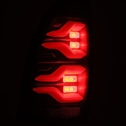 AlphaRex 05-15 Toyota Tacoma LUXX LED Taillights Blk w/Activ Light/Seq Signal - 680060