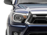 Raxiom 12-15 Toyota Tacoma Axial Projector Headlights w/ SEQL LED Bar- Blk Housing (Clear Lens) - TT21850