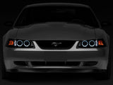 Raxiom 99-04 Ford Mustang Dual LED Halo Projector Headlights- Black Housing (Smoked Lens) - 49113