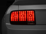 Raxiom 05-09 Ford Mustang Tail Lights- Black Housing (Smoked Lens) - 49066